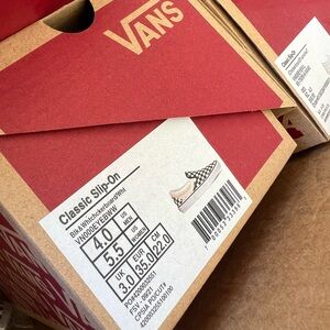 Vans classic slip on, new in box.